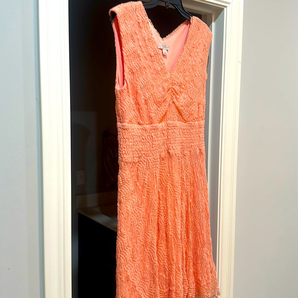 Beautiful peach lace dresss worn to a spring wedding